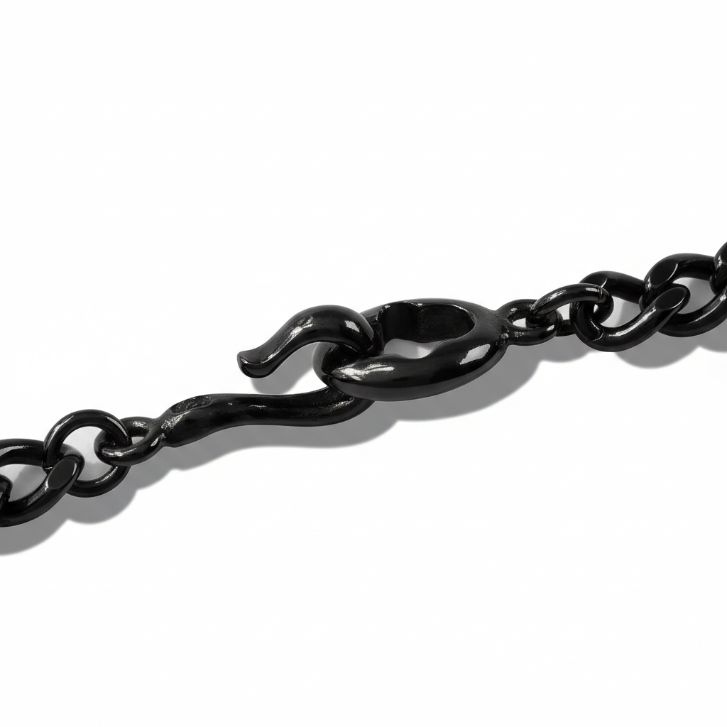 Layered black chain necklace on black display bust 2