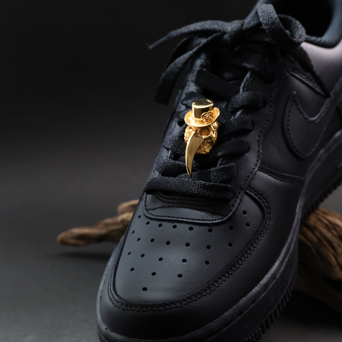 Masquerade plague doctor gold ring on black flower background